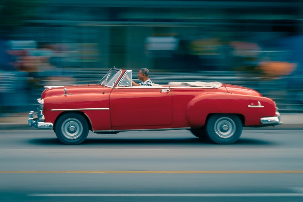Red Classic Car Motion by Andy Bauer — canvas wall art