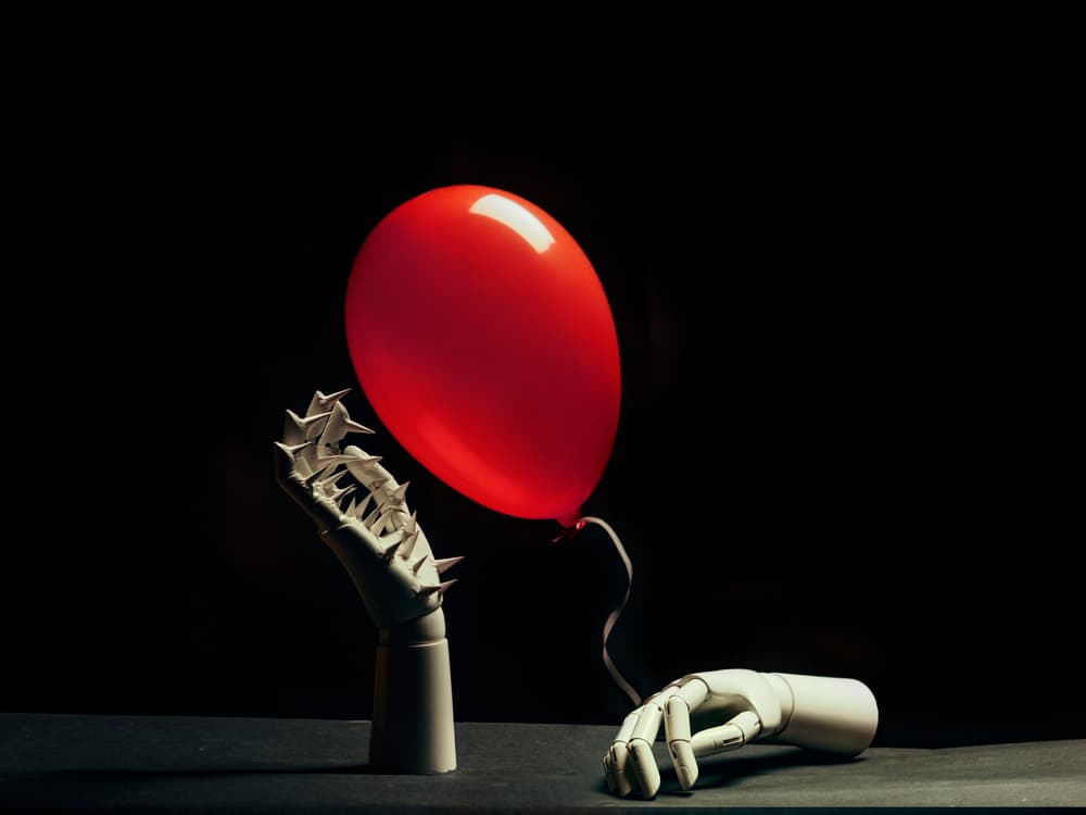 Red Balloon Spooky Hand by Dan-Stefan Susa — canvas wall art
