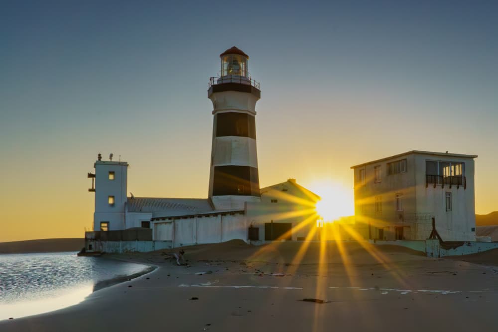 Golden Hour Lighthouse by Etienne Steenkamp — canvas wall art