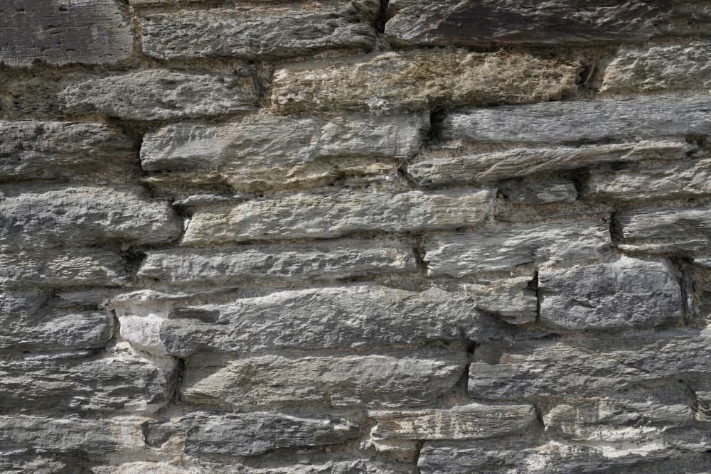 Weathered Stone Wall by Bilge Paksoylu — canvas wall art