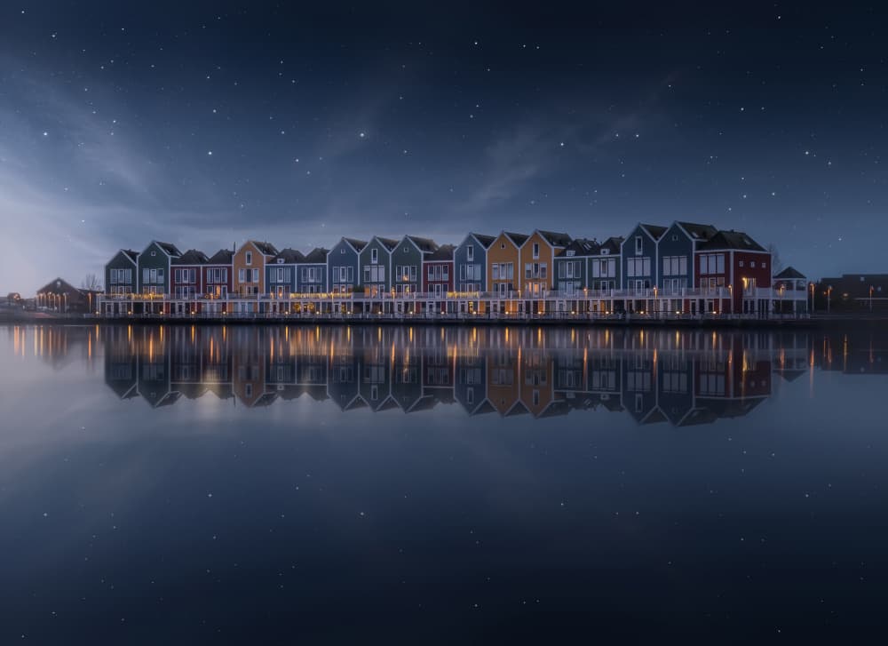 Colorful Houses Night Reflections by Remo Daut — canvas wall art