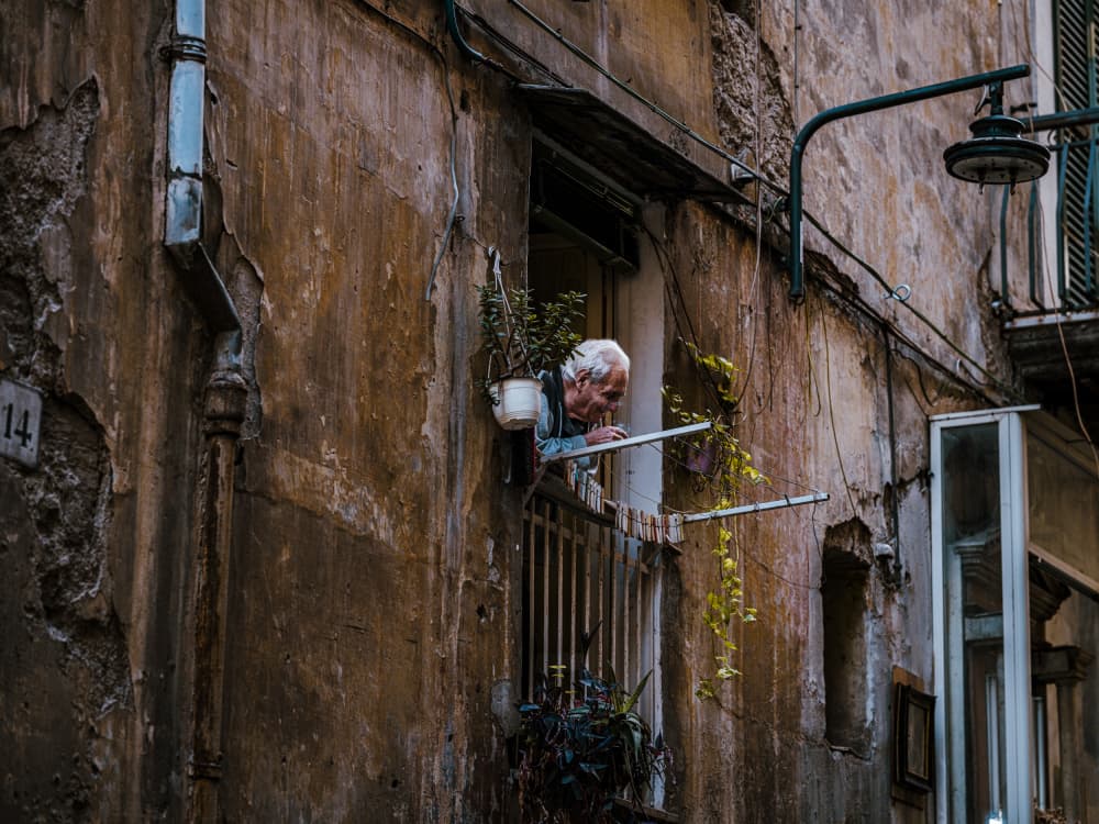 Old Man On Balcony by Robert Sherman — canvas wall art