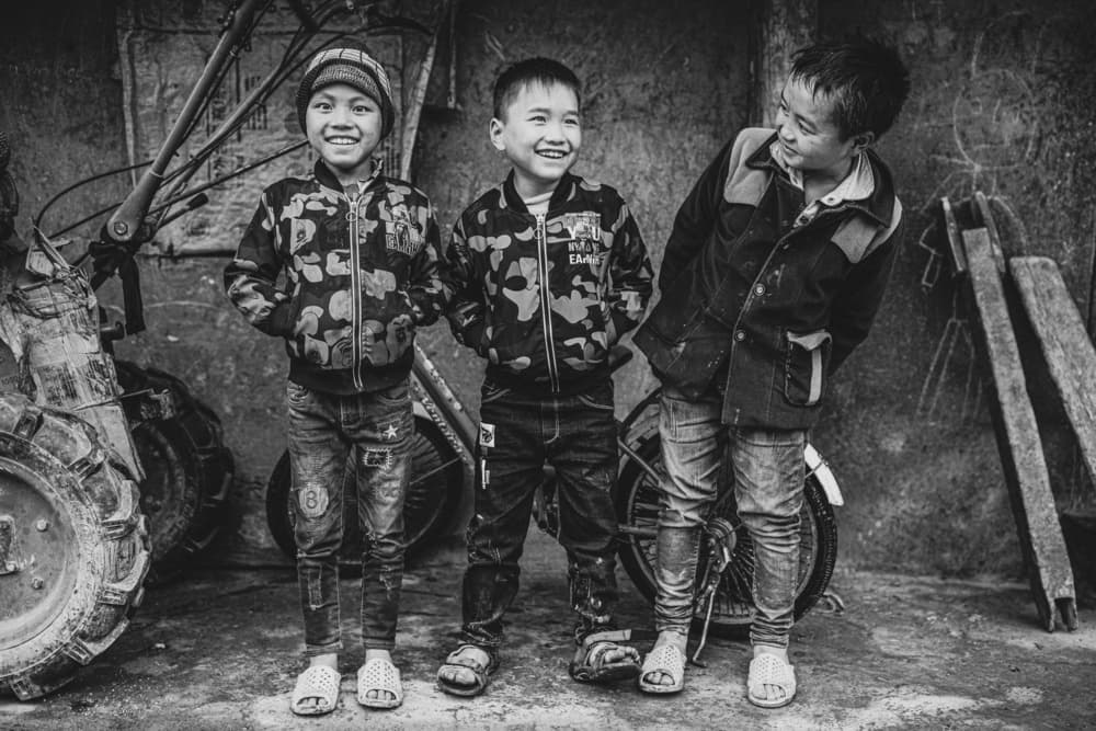 Smiling Village Boys by Marco Tagliarino — canvas wall art
