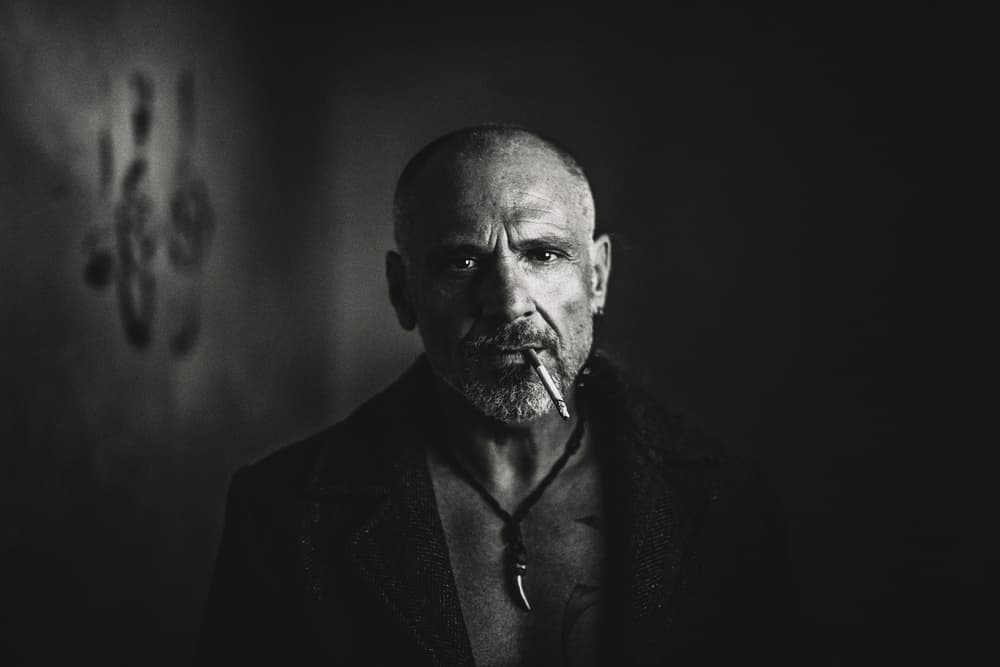 Intense Man Smoking by Erkan Camlilar — canvas wall art