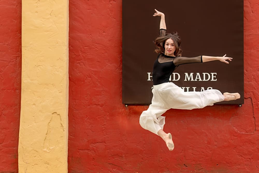 Graceful Urban Leap by Q Liu — canvas wall art