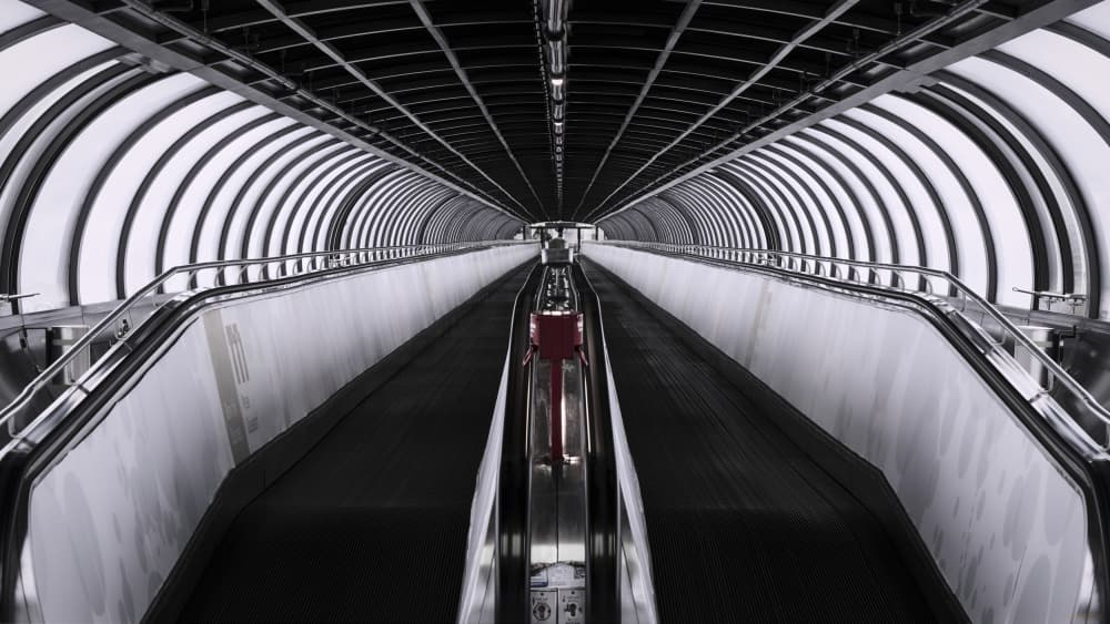 Futuristic Escalator Tunnel by Drazen Sokac — canvas wall art