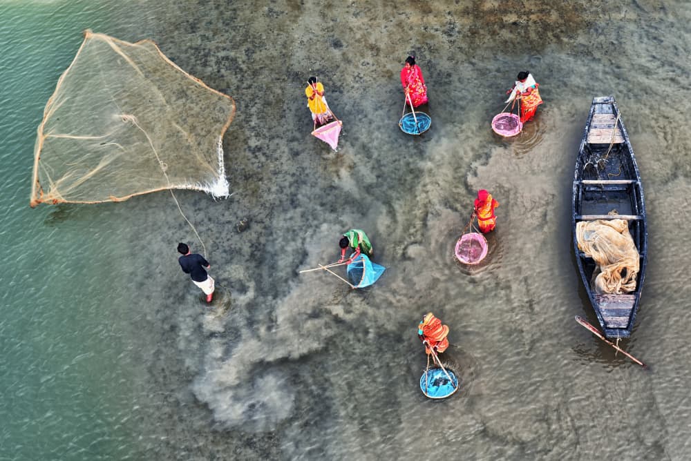 Traditional River Fishing by Abhraneel Chakraborty — canvas wall art