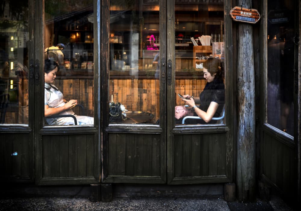 Urban Cafe Window Women by Leah Guo — canvas wall art