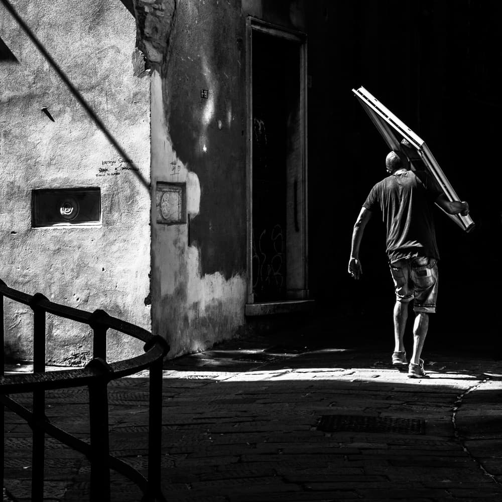Man Walking Into Shadow by Alessandro Traverso — canvas wall art
