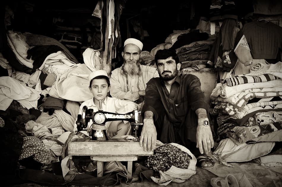 Market Tailor Family by Nicolas Marino — canvas wall art