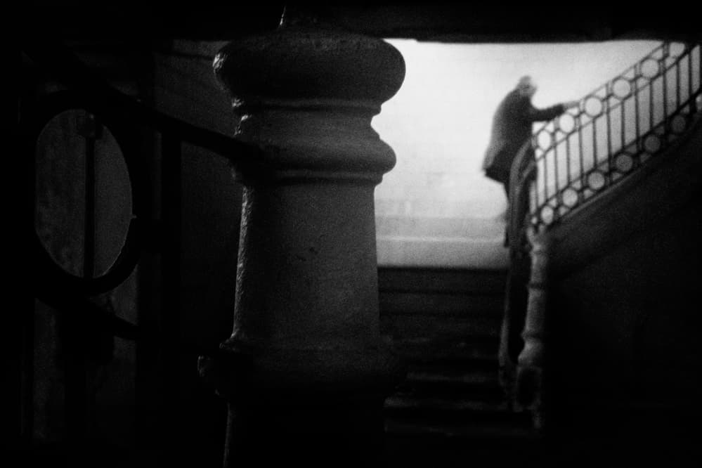 Man Ascending Dark Stairs by Laura Mexia — canvas wall art