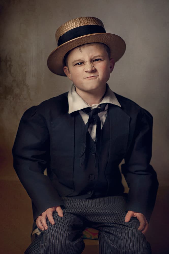 Grumpy Boy In Hat by Monika Vanhercke — canvas wall art