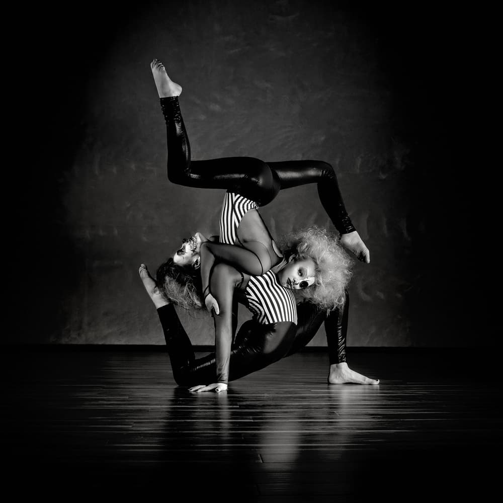Acrobatic Clown Dancers by David Naman — canvas wall art