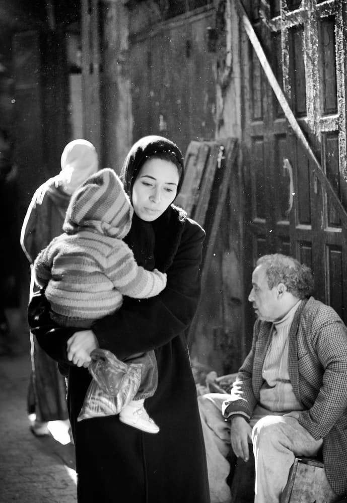 Family Street Moment by Martin Froyda — canvas wall art