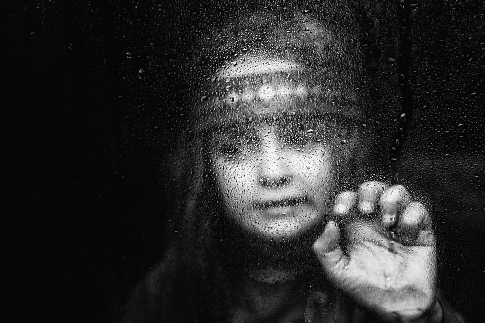 Child Behind Wet Glass by Dominic Schroeyers — canvas wall art