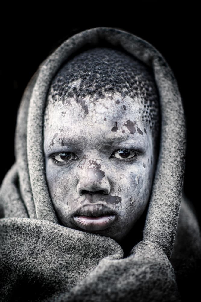 Intense Hooded Child by Trevor Cole — canvas wall art
