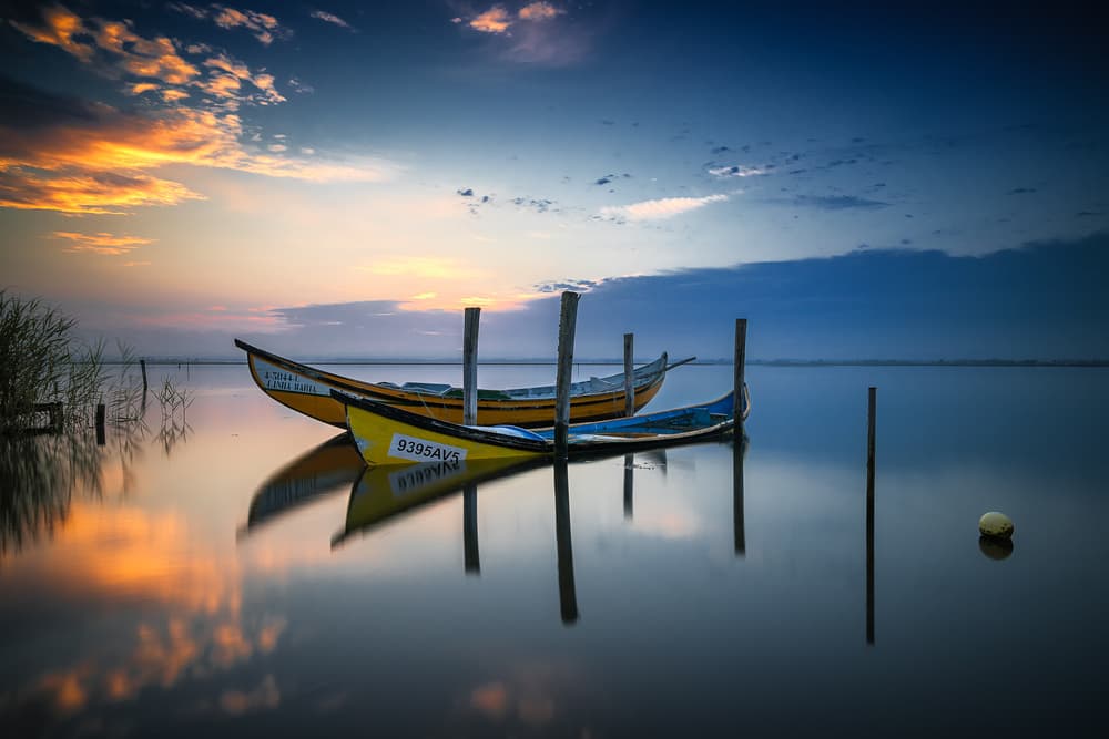 Tranquil Boat Reflections by Rui Ribeiro — canvas wall art