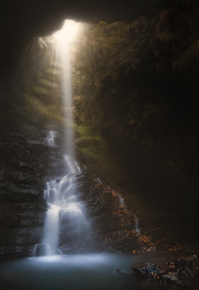 Sunlit Grotto Waterfall by Paolo Lazzarotti — canvas wall art