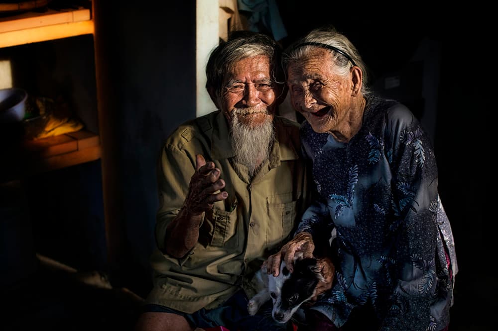 Joyful Couple with Dog by Burak Senbak — canvas wall art