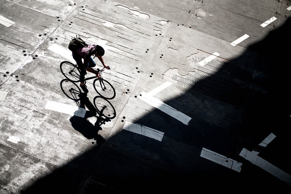 Overhead Cyclist Shadow by Satoshi Iwata — canvas wall art