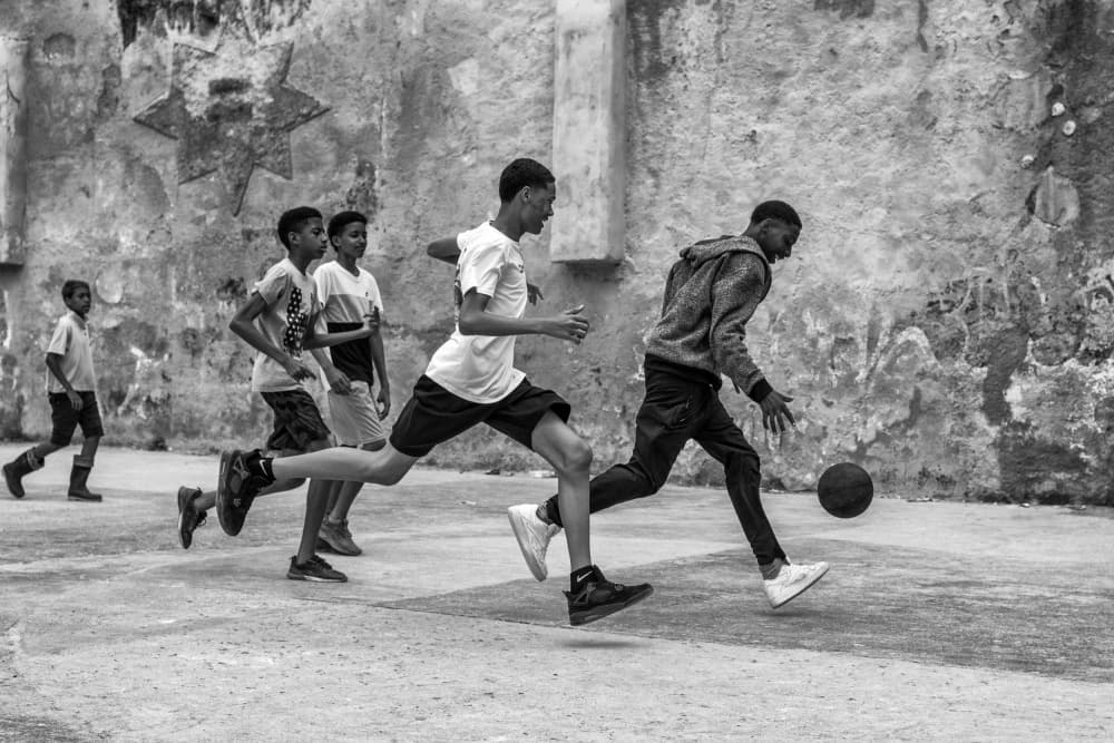 Youthful Street Soccer by Pavol Stranak — canvas wall art