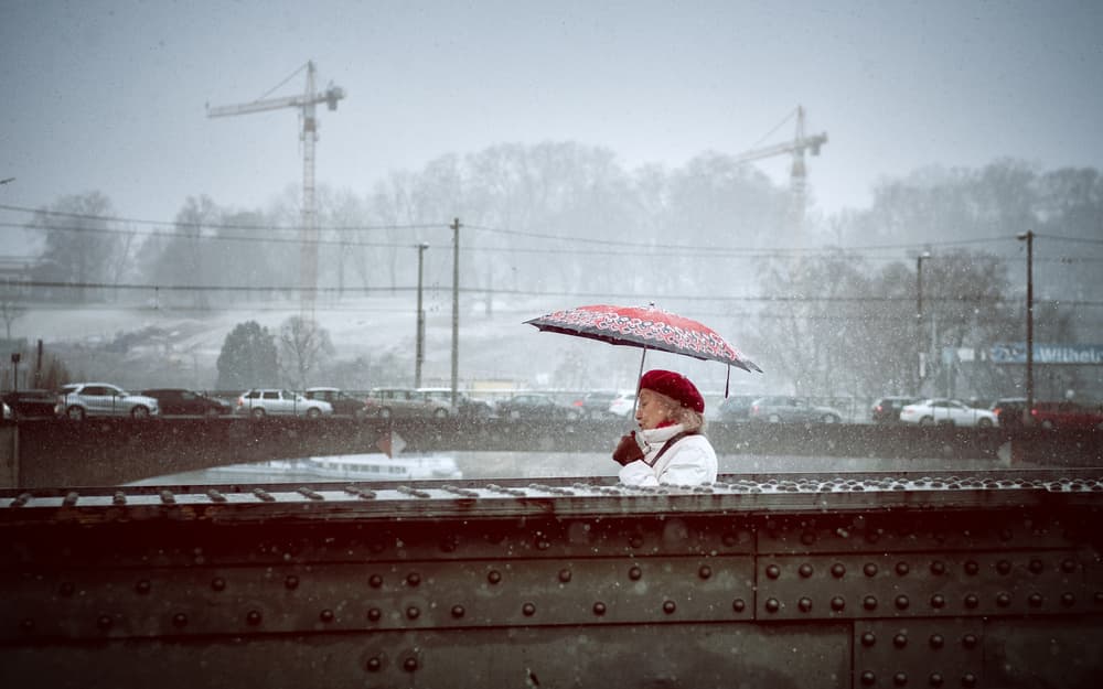 Red Umbrella Winter City by Jürgen Hartlieb — canvas wall art