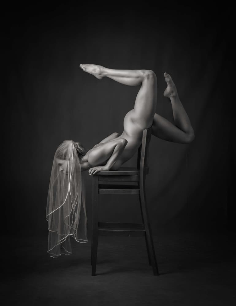 Chair Acrobat by Catchlight Studio — canvas wall art