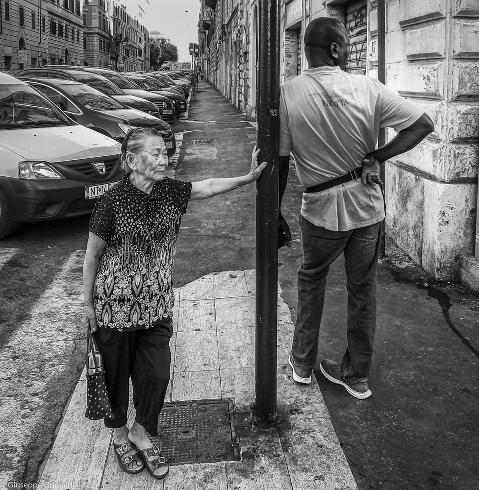 City Sidewalk Moment by Giuseppe Grimaldi — canvas wall art