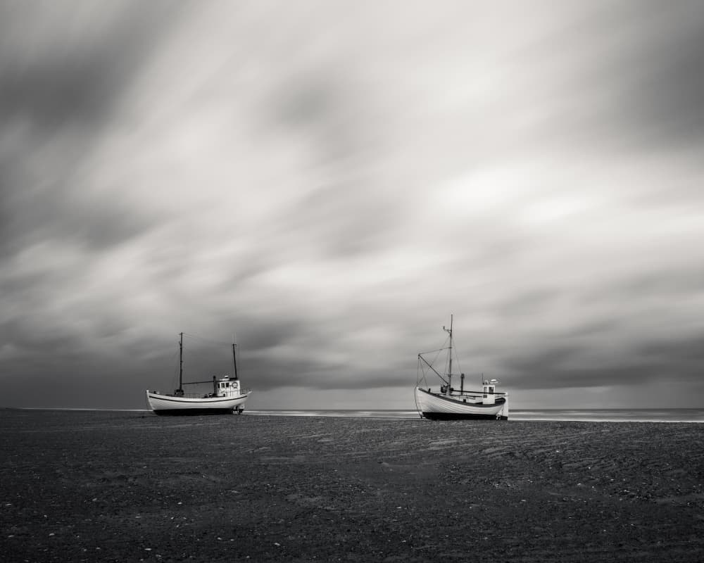Two Boats Moody Sky by Andreas Christensen — canvas wall art