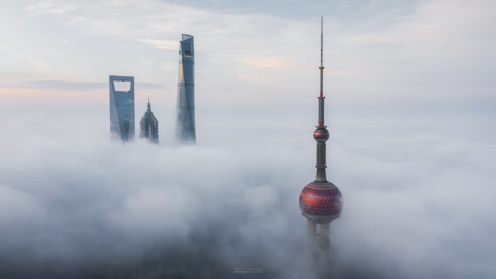 Towers Above The Clouds by Steve Zhang — canvas wall art