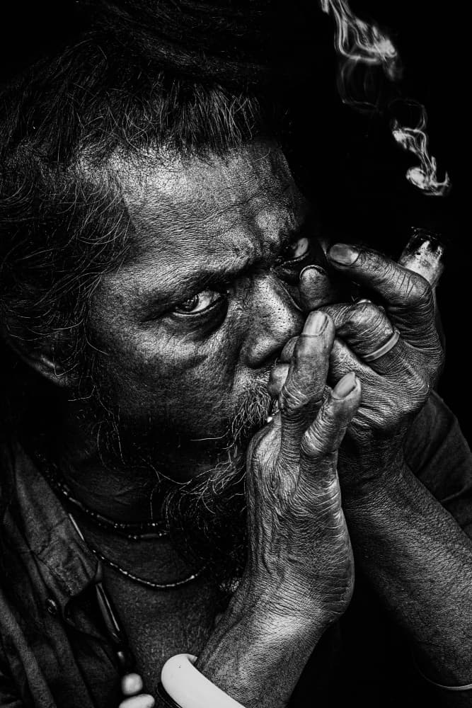Intense Sadhu Smoke by JAYATU CHANDRA DAS — canvas wall art