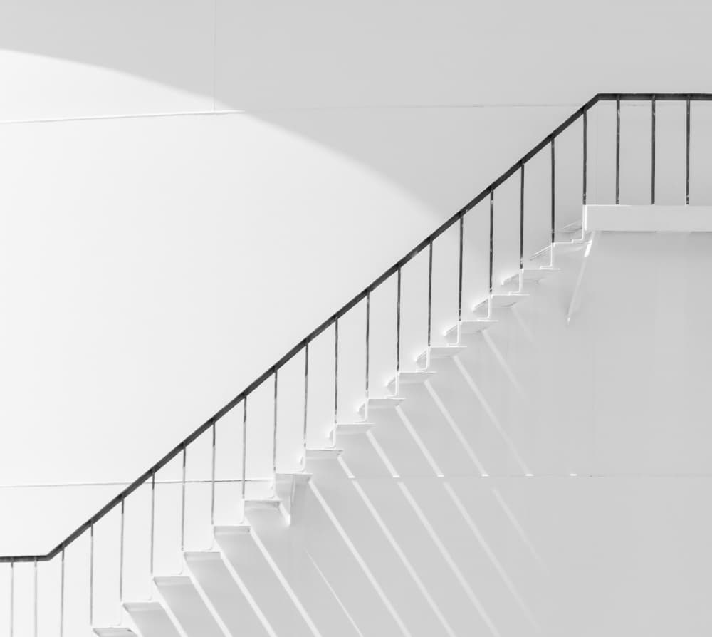Geometric Staircase Shadows by Jacqueline Hammer — canvas wall art
