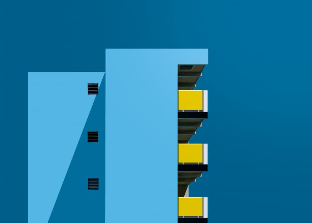 Yellow Balconies Blue Sky by wiebe wilbers — canvas wall art