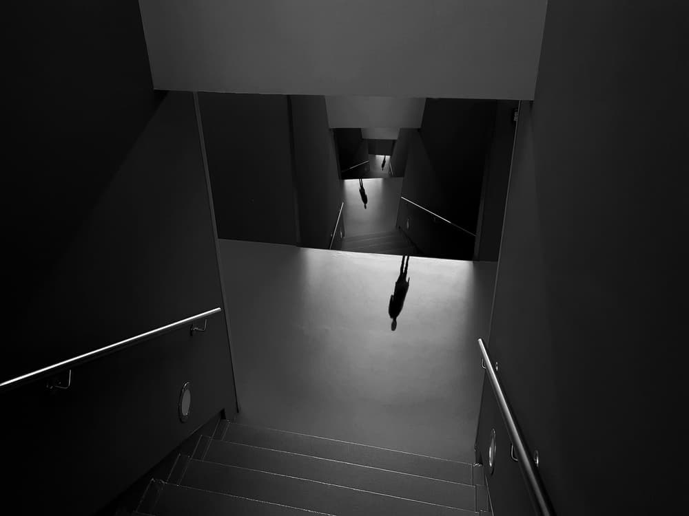 Shadowy Figures on Stairs by Huib Limberg — canvas wall art