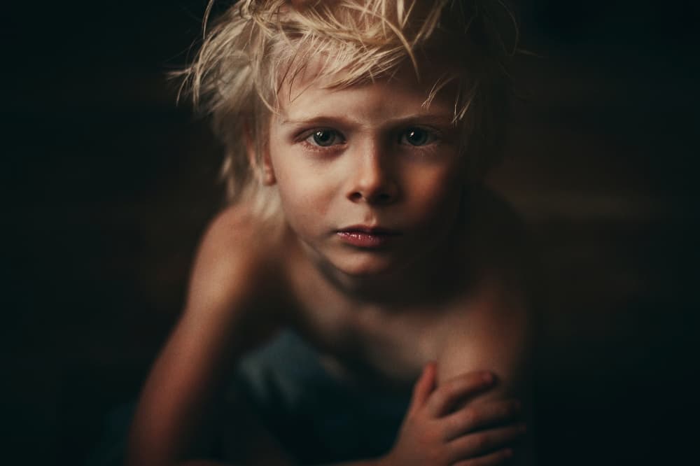 Pensive Young Boy by Natalia Zhukova — canvas wall art