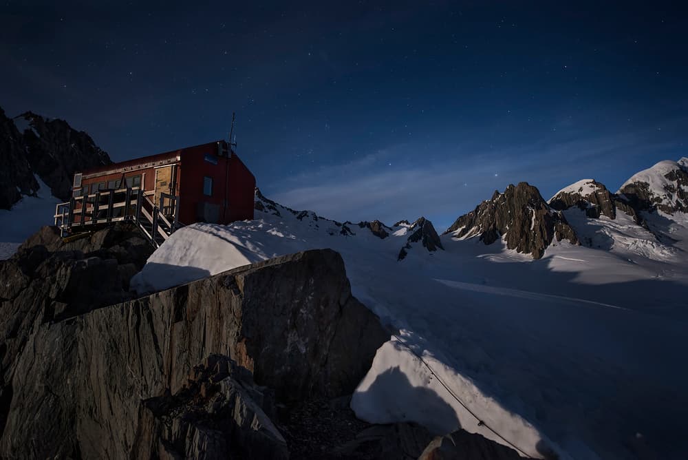 Red Hut Under Stars by Yan Zhang — canvas wall art