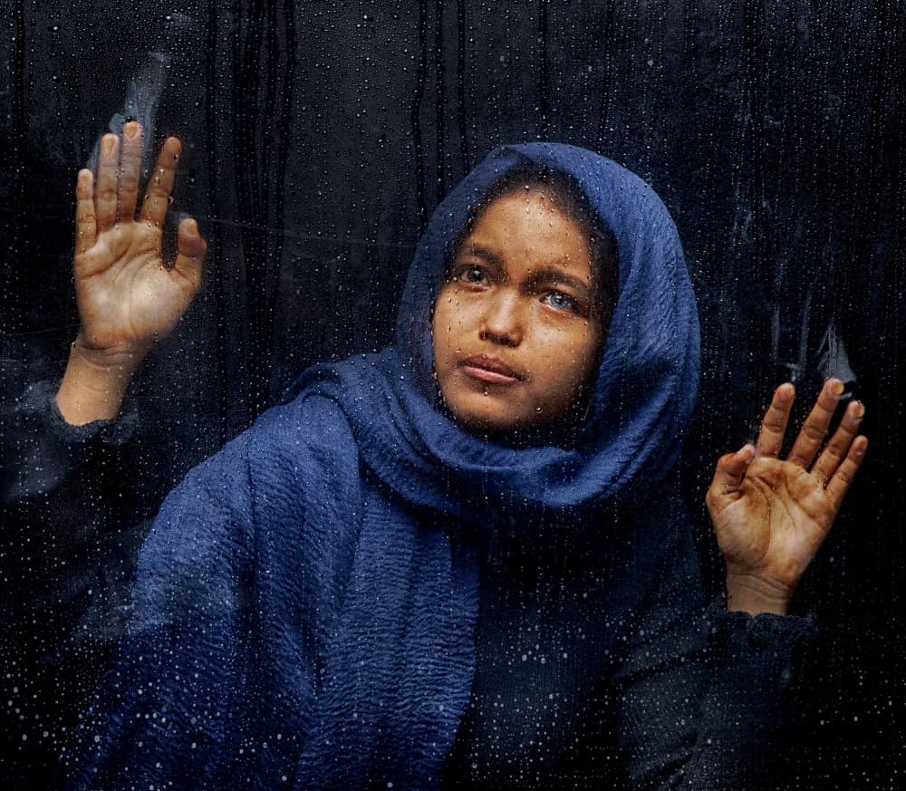 Pensive Girl Rainy Window by Angela Muliani Hartojo — canvas wall art