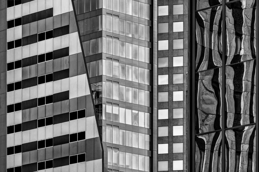 Monochrome City Facades by Wayne Pearson — canvas wall art