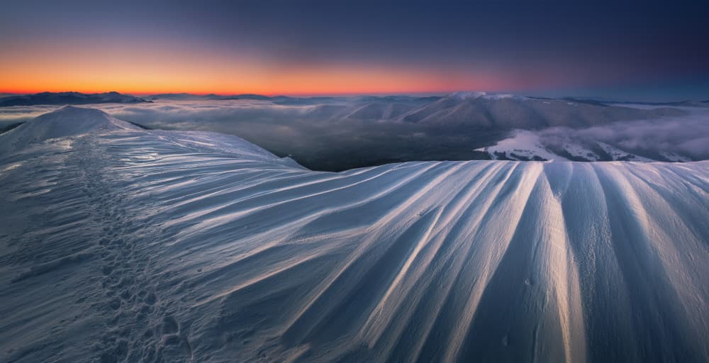 Snowy Ridge Winter Dawn by Karol Nienartowicz — canvas wall art