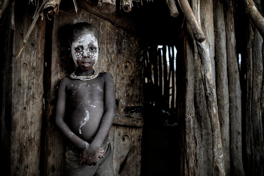 Painted Tribal Child by Mohammed Al Sulaili — canvas wall art
