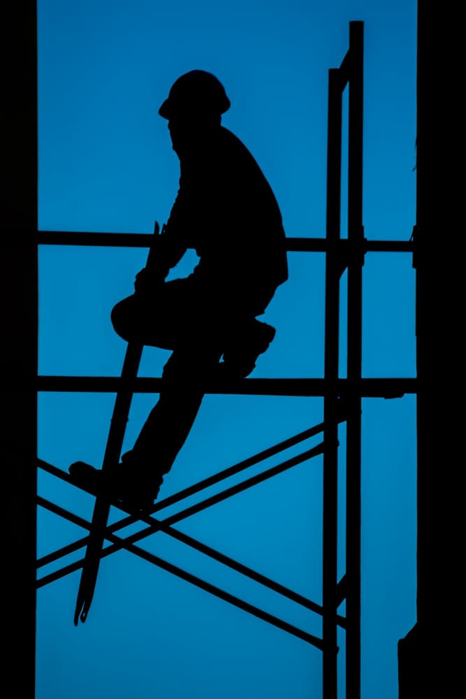 Industrial Worker Silhouette by Tal Paz-Fridman — canvas wall art