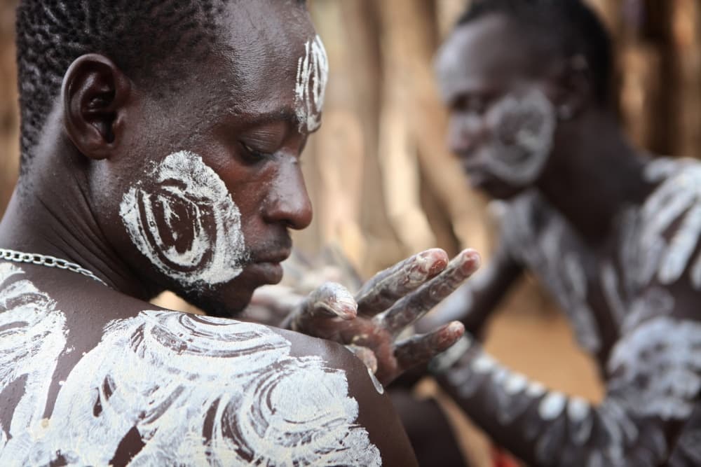 African Body Paint Ritual by Hesham Alhumaid — canvas wall art