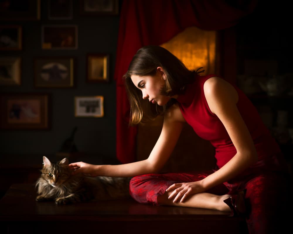 Elegant Woman Petting Cat by Małgorzata Masarz — canvas wall art