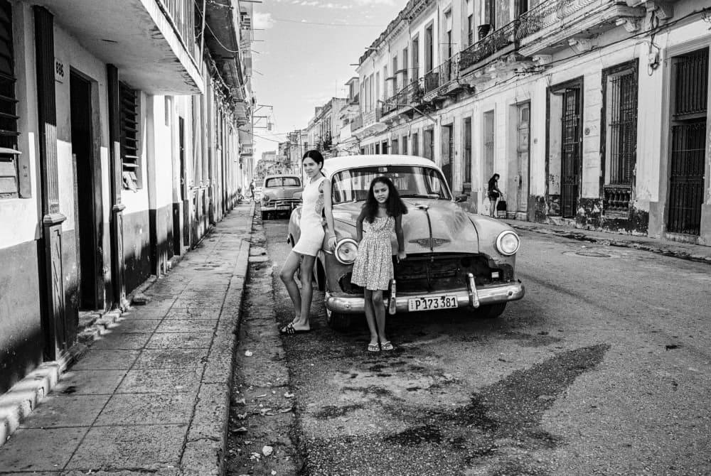 Cuban Women Classic Car by Ken Frank — canvas wall art