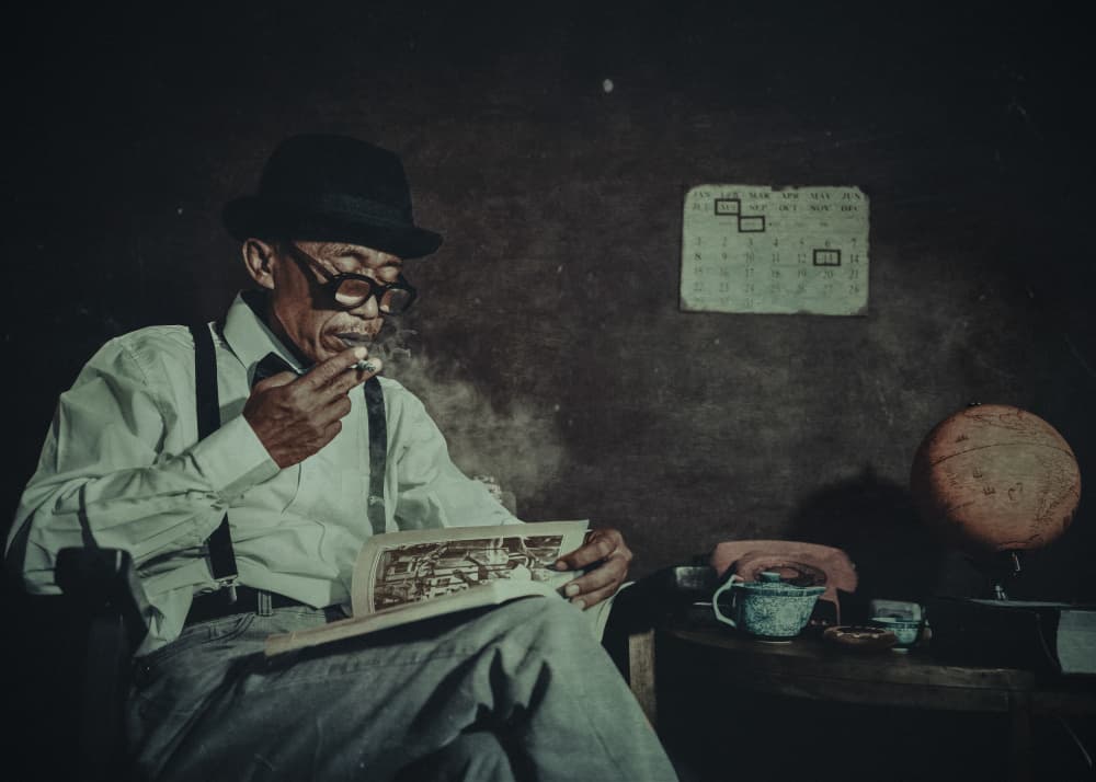 Old Man Reading Smoke by Djayent Abdillah — canvas wall art