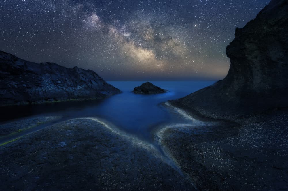 Milky Way Ocean Glow by Albena Markova — canvas wall art