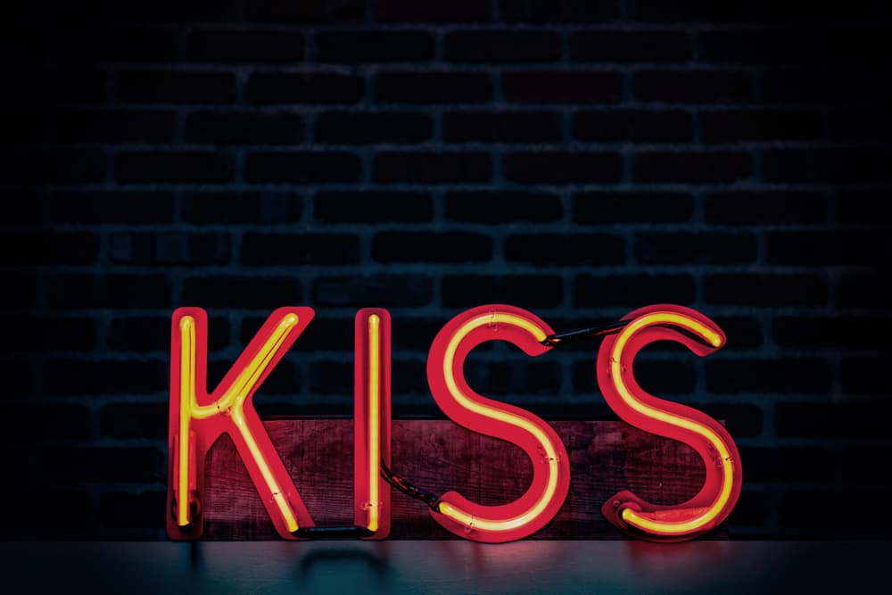 Retro Kiss Neon Sign by Tim Mossholder — canvas wall art