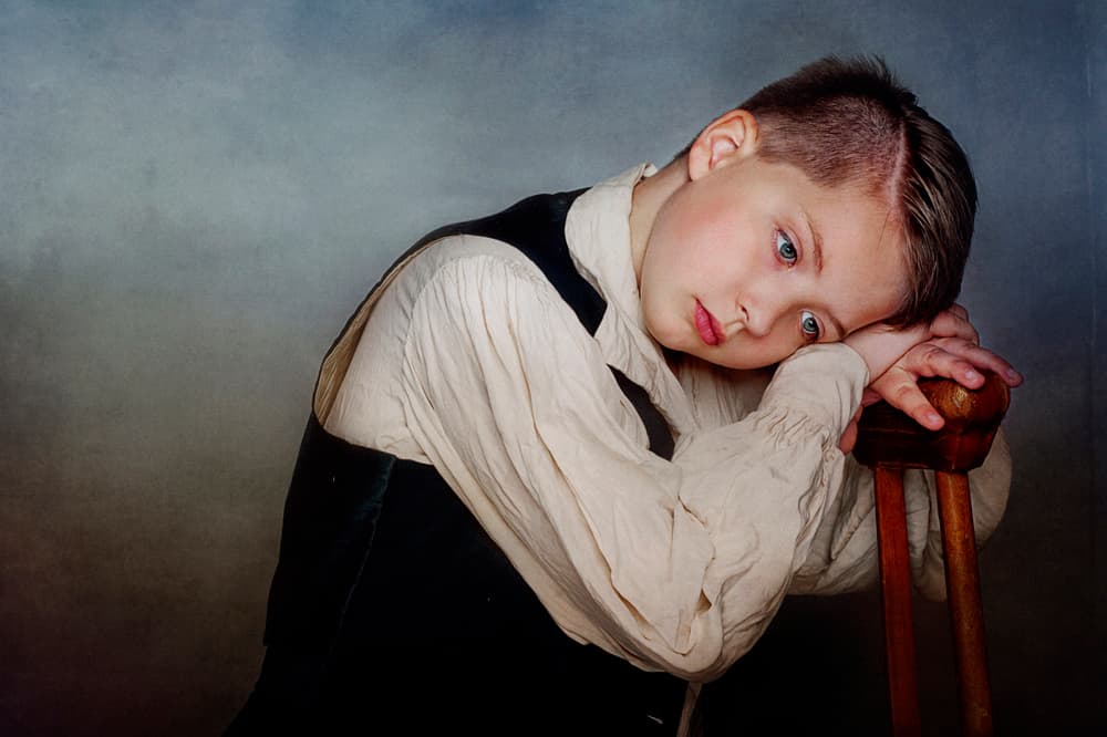 Pensive Young Boy by Monika Vanhercke — canvas wall art