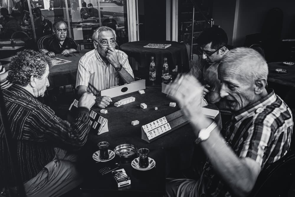 Old Men Playing Game by Marco Tagliarino — canvas wall art
