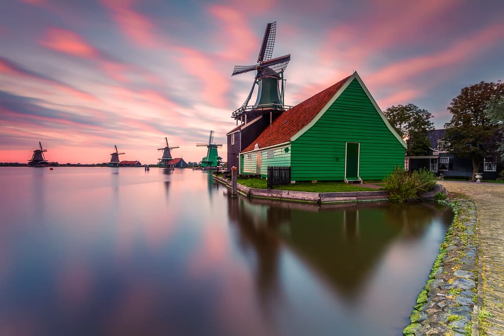 Dutch Windmills Sunset by Carlos M. Almagro — canvas wall art